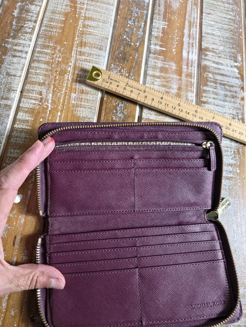 Michael Kors Plum Saffiano Zip Around Wallet with Gold Hardware